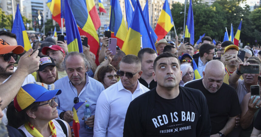 videofoto cateva sute de persoane si george simion au protestat in piata victoriei impotriva austeritatii manifestatii aur si in alte orase 685851bb47bbf