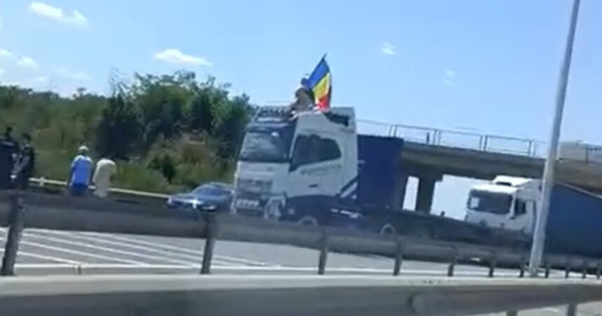 video protest pe a1 un sofer de tir a blocat autostrada si a fluturat steagul romaniei de pe cabina 687cf42d02059