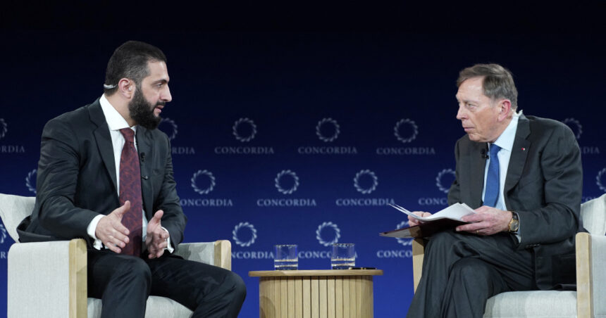 analiza o imagine suprarealista un general american si un fost jihadist pe aceeasi scena david petraeus l a intervievat pe ahmed al sharaa 68d3a680c7db2