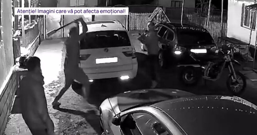 video un barbat a intrat cu toporul intr o casa l a atacat pe proprietar si a distrus doua masini imagini de pe camera de supraveghere 694e34008ac45