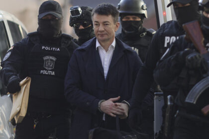 video imagini cu extradarea lui alexandru balan fostul director adjunct al serviciului de informatii din moldova care a spionat pentru kgb 69eb090226c81