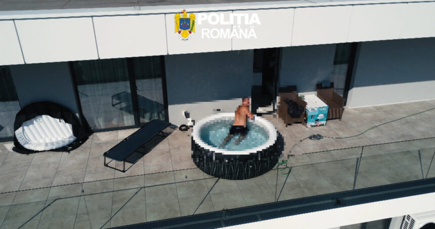 video momentul in care un roman urmarit international este saltat de politisti dintr o piscina gonflabila de pe terasa apartamentului sau 6a3fab91c5319